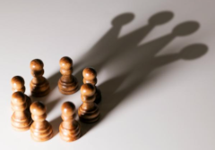 pawns with the shadow of a king
